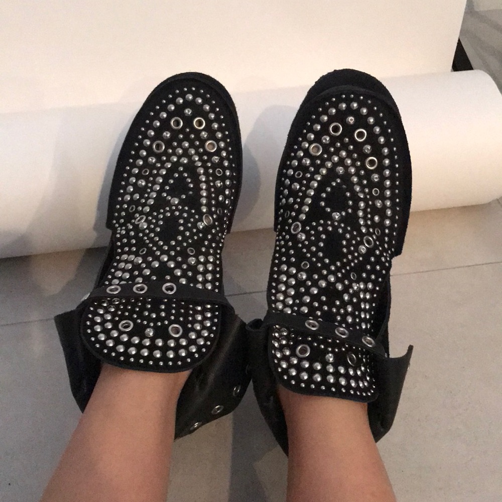Studded black moccasins